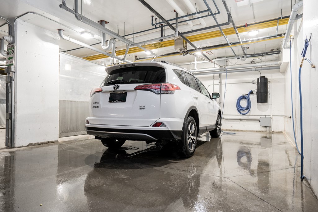 a white car parked in a parking garage