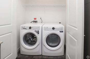 washer and dryer in a small laundry room