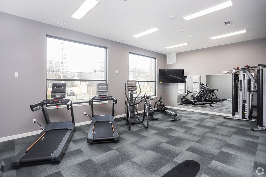 a fitness center with gym equipment