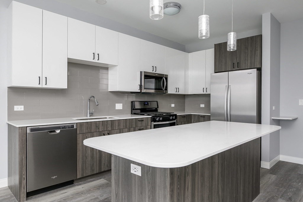 a kitchen with stainless steel appliances