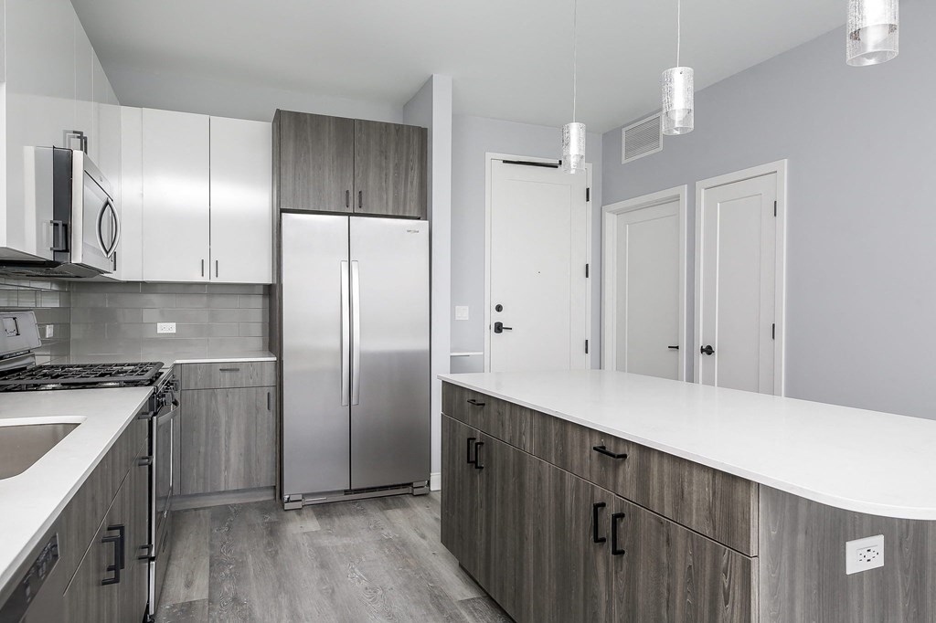 a kitchen with stainless steel appliances