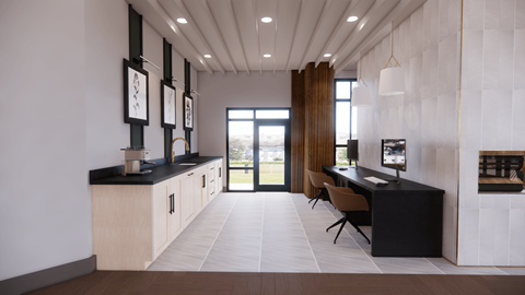 a study area with a desk and chairs and a glass door