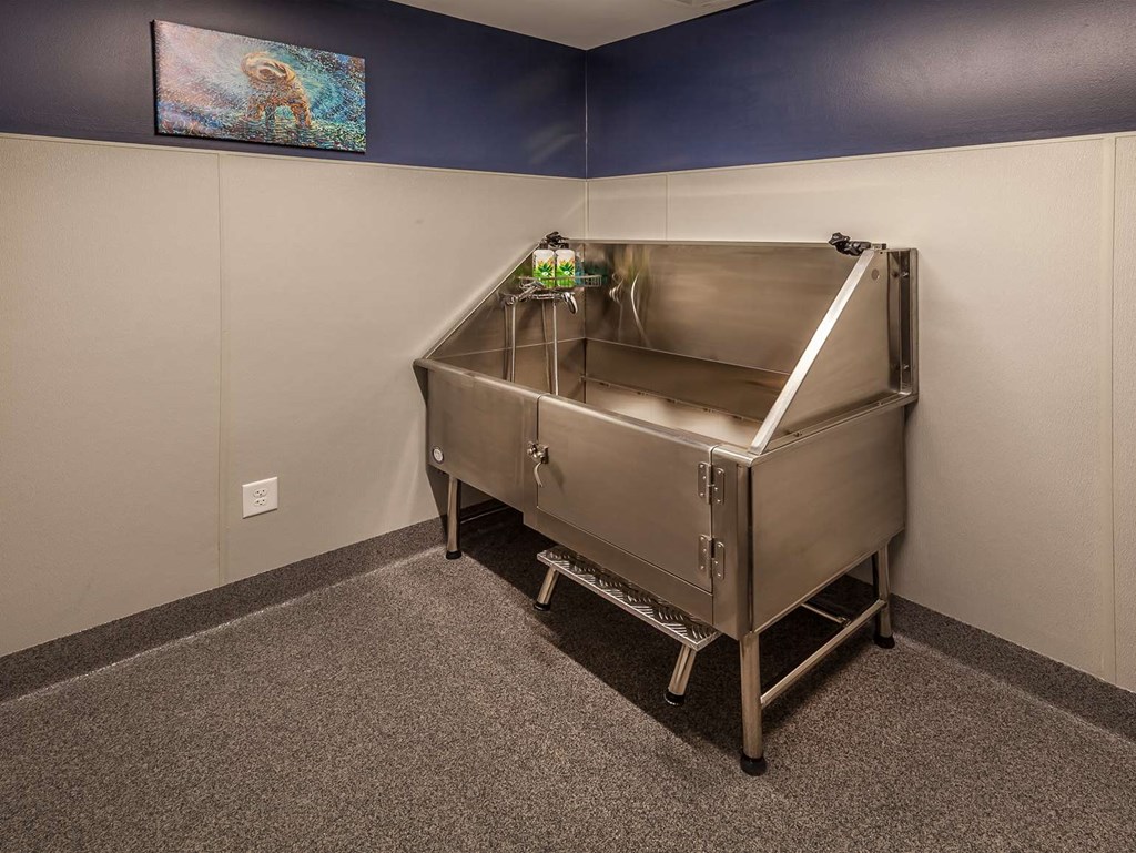 a stainless steel sink in a room