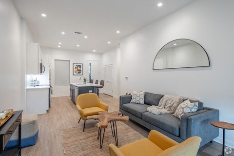 a living room with a couch and a table