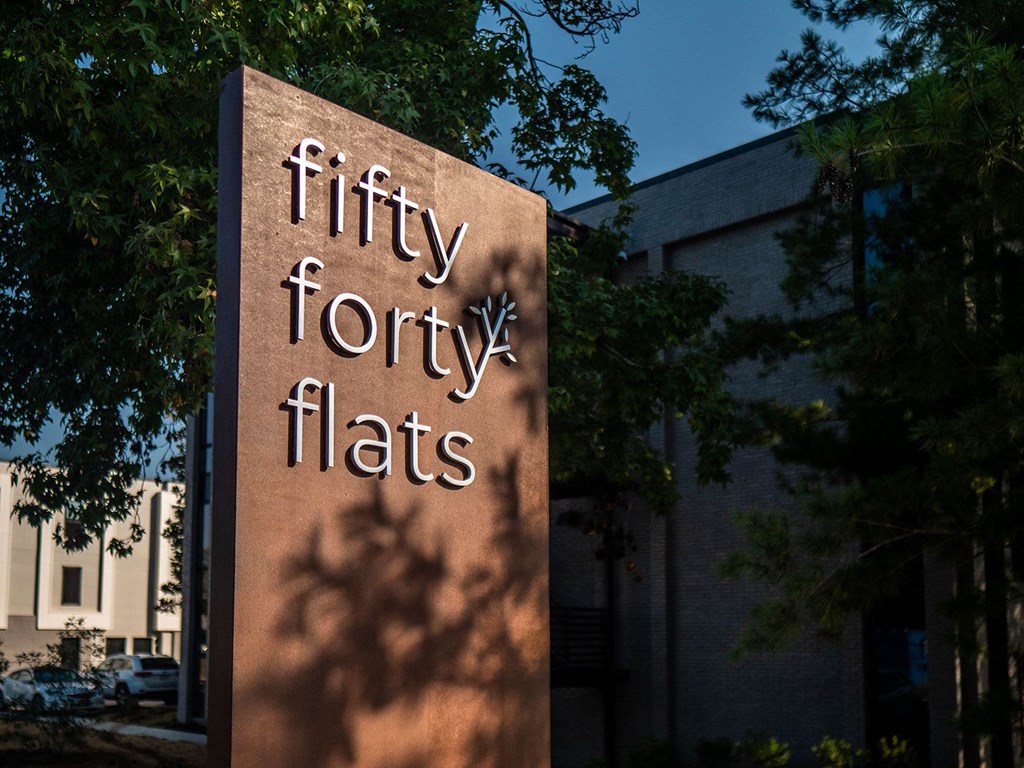 fifty forty flats sign