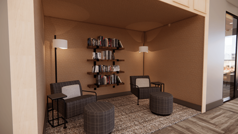 a living room with chairs and a book shelf