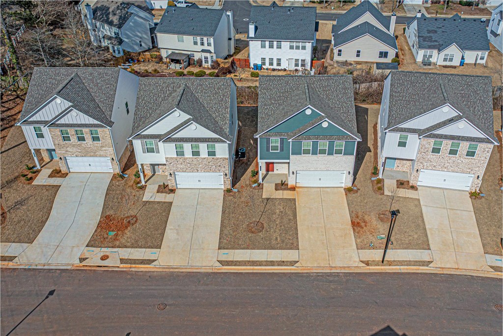 an aerial view of several houses in a neighborhood