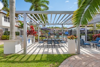 The Isles Apartment pergola by the pool - Photo Gallery 19