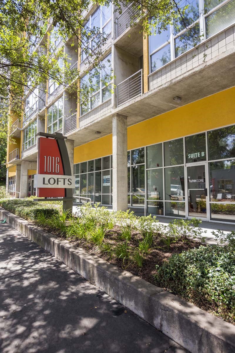a large building with a sign in front of it