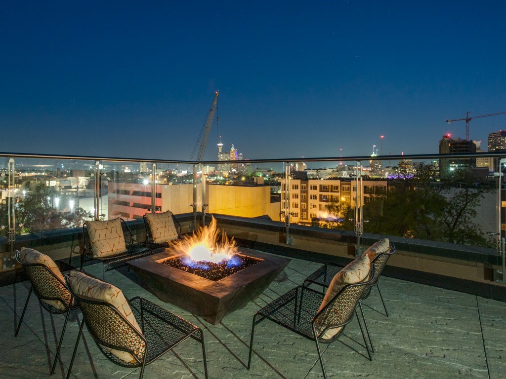 Nighttime firepit on the roof