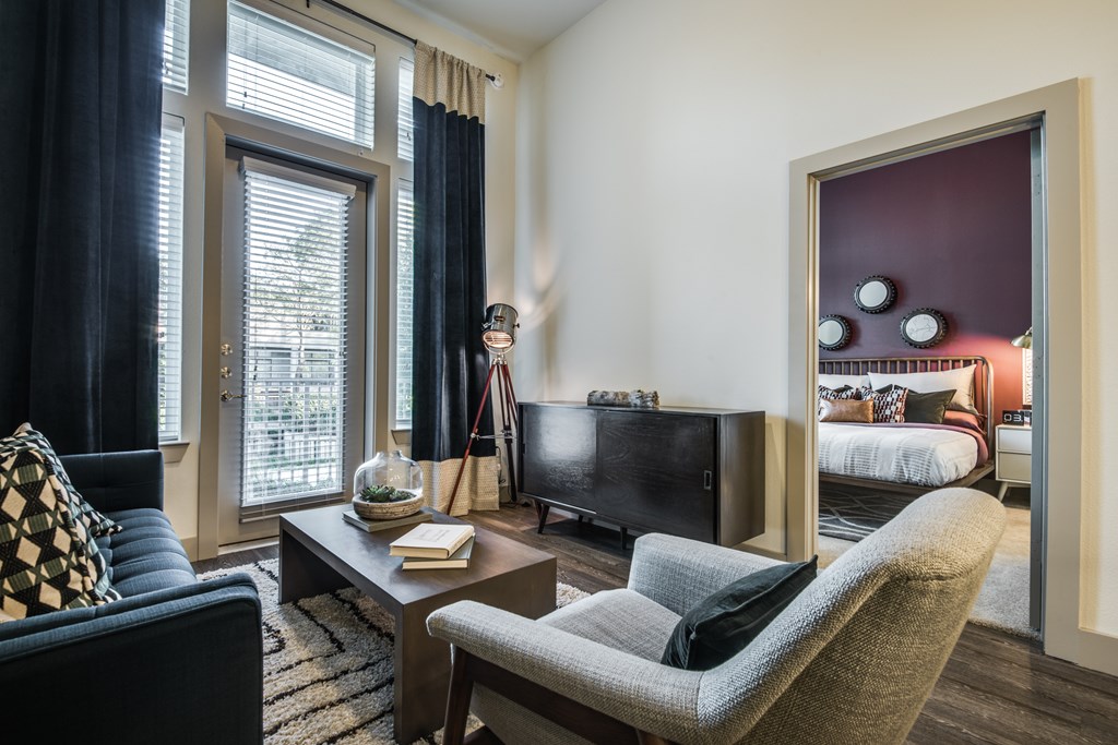 One bedroom living room with floor to ceiling windows