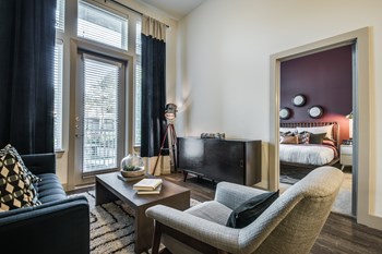 One bedroom living room with floor to ceiling windows - Photo Gallery 5