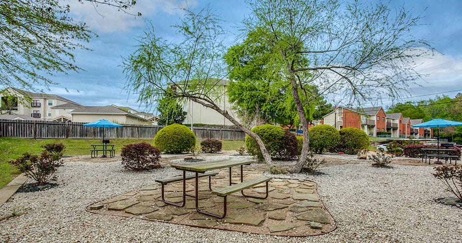 Outdoor picnic tables with shading