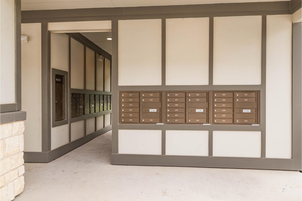 a view of a building with mailboxes on the wall