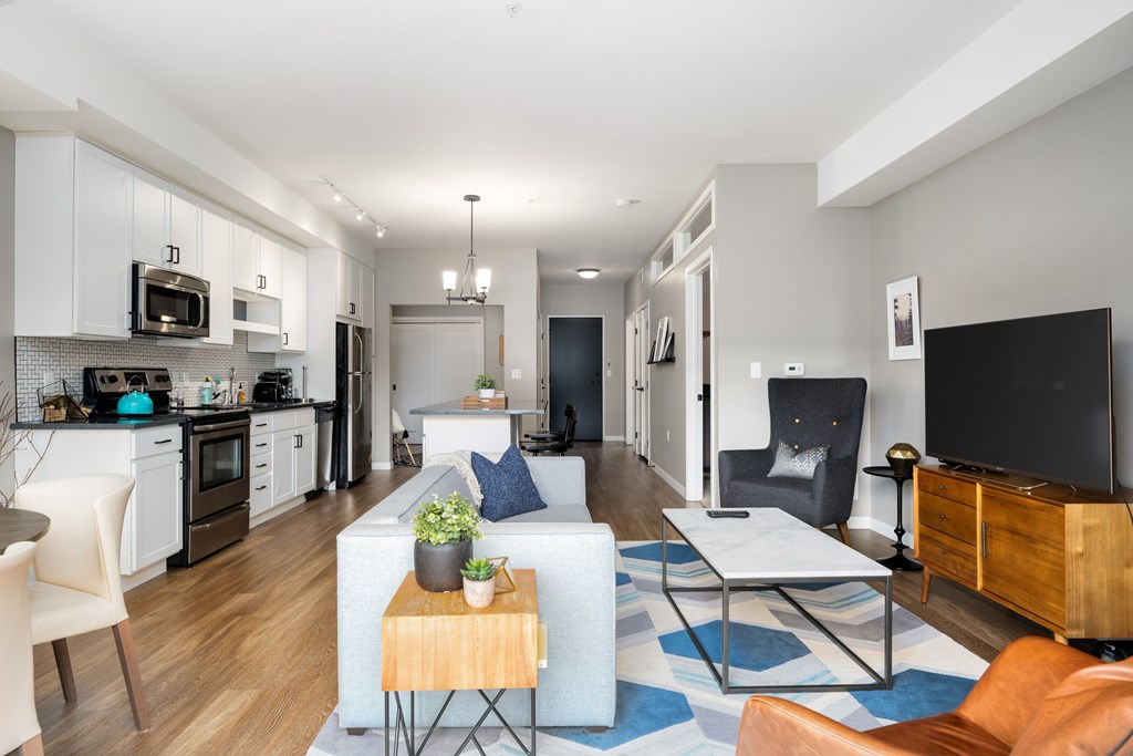 Vintage on Selby | St. Paul, MN |a living room with a couch and a table
