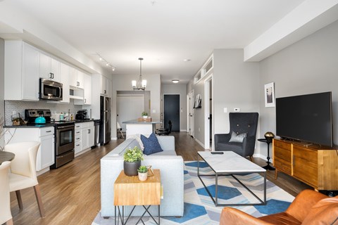 a living room with a couch and a table