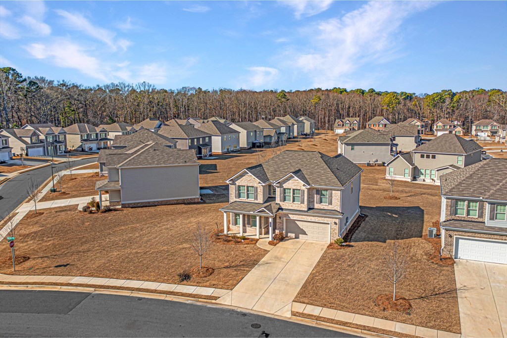 an aerial view of a neighborhood of houses