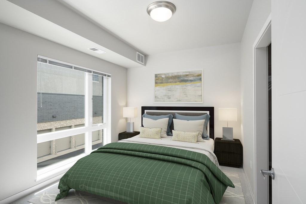 One BR Apartments in Lakeville MN - Lakeside Flats - Carpetted Bedroom, Unfurnished, with Light Grey Walls, Large Windows, and Overhead Lighting