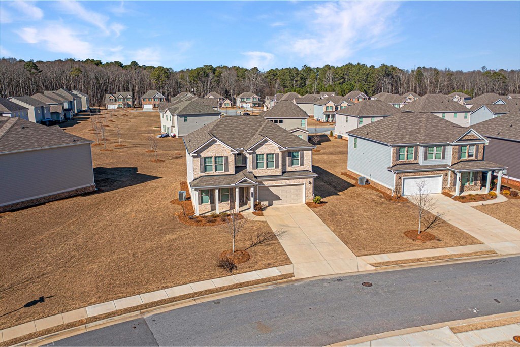 an aerial view of several houses in a neighborhood