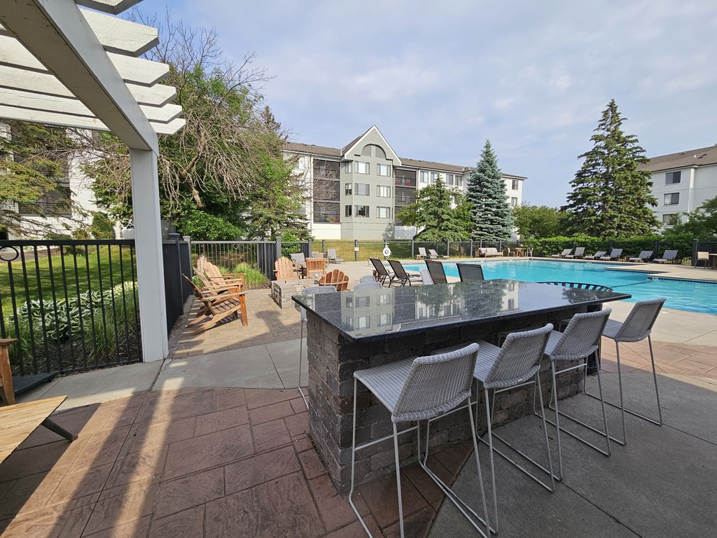 seating near the outdoor pool at The Burlington Apartments in St Paul, MN
