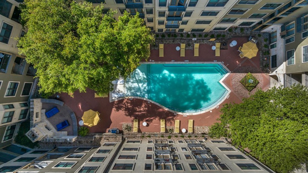 an aerial view of the pool at the hotel atrium