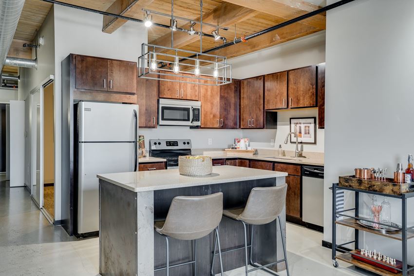 Loft style kitchen with exposed beams