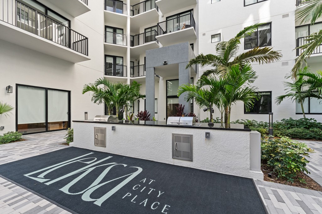 Outdoor summer kitchen with 2 large gas grills