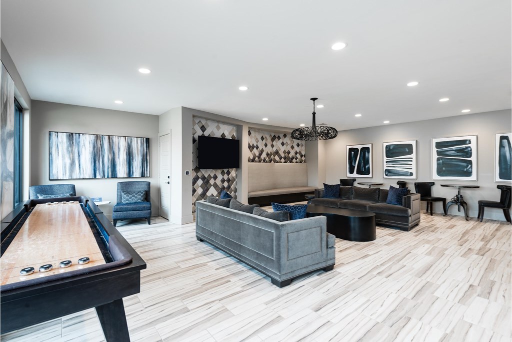 a large living room with a pool table