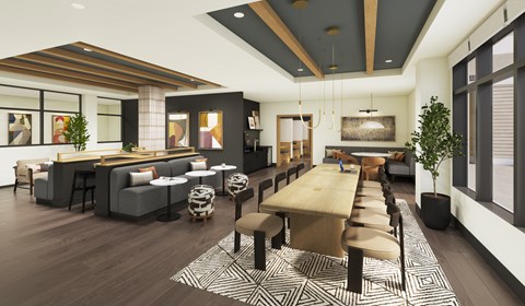 A modern dining room with a long table and chairs.
