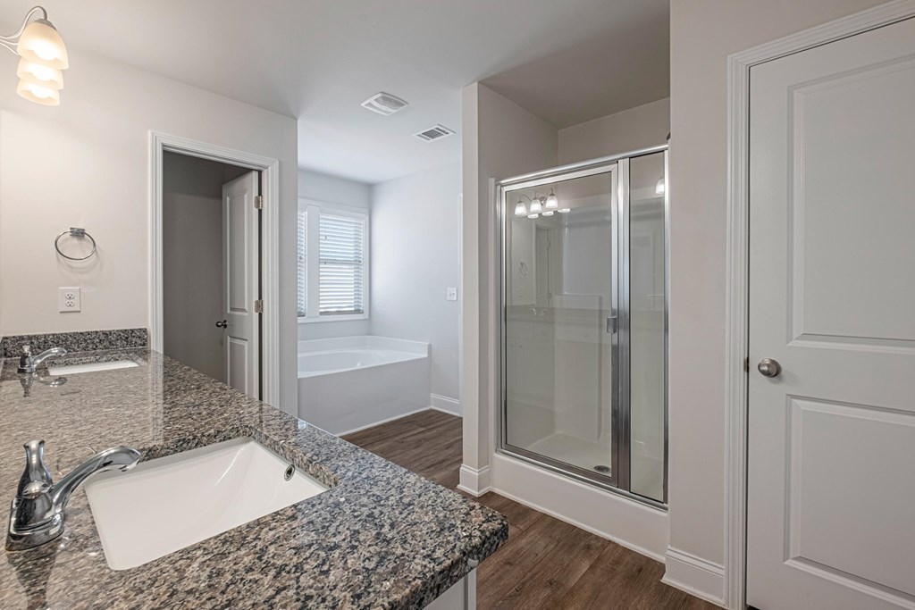 a bathroom with a sink and a shower