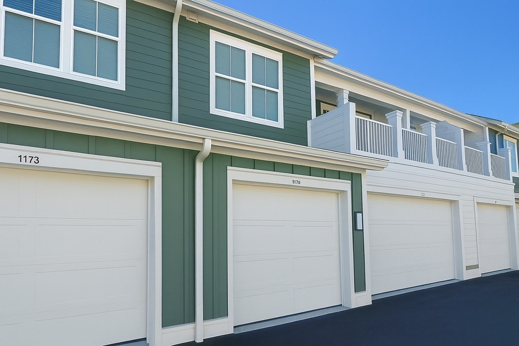 A row of garage doors are closed.