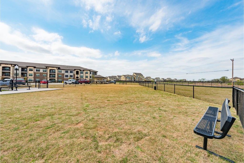 the preserve at ballantyne commons park bench in front of apartment buildings