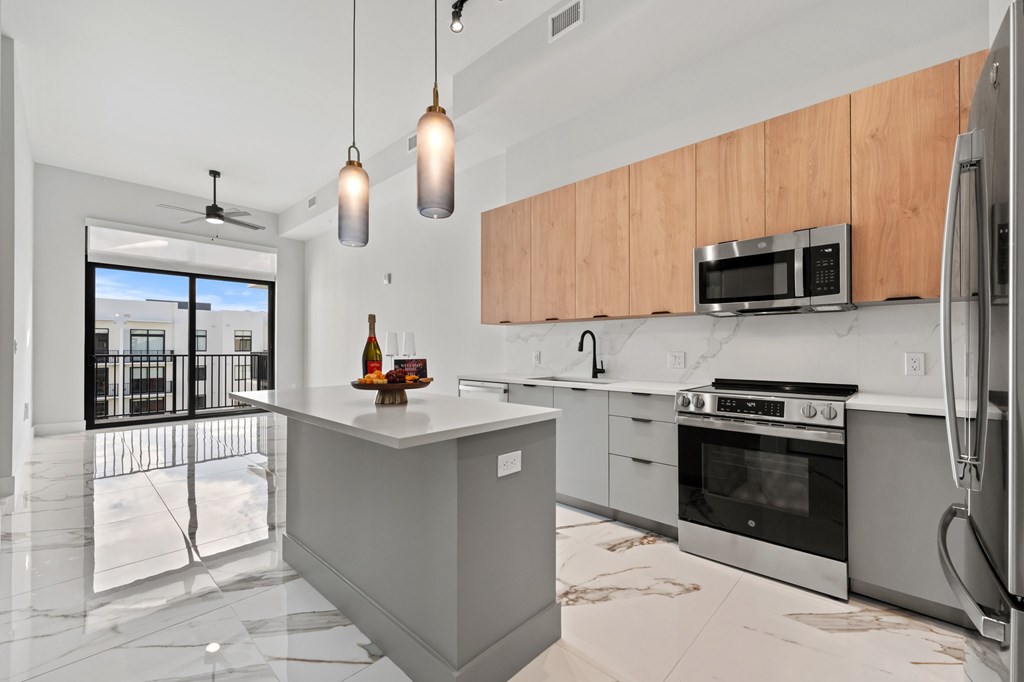 Penthouse floorplan with upgraded fixtures and Marble-effect porcelain flooring