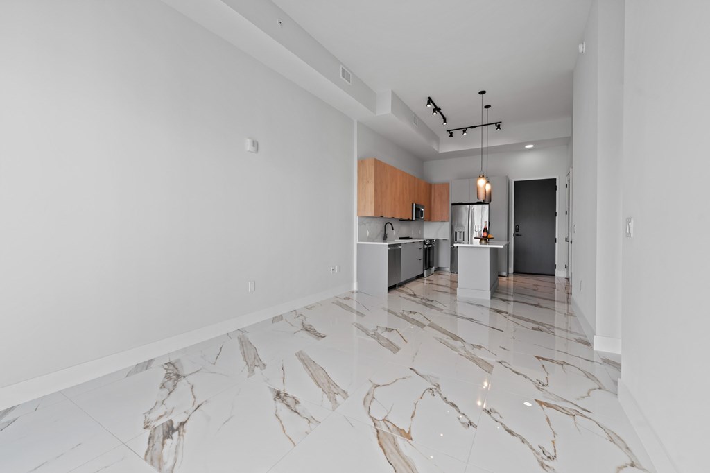 Penthouse floorplan with upgraded fixtures and Marble-effect porcelain flooring