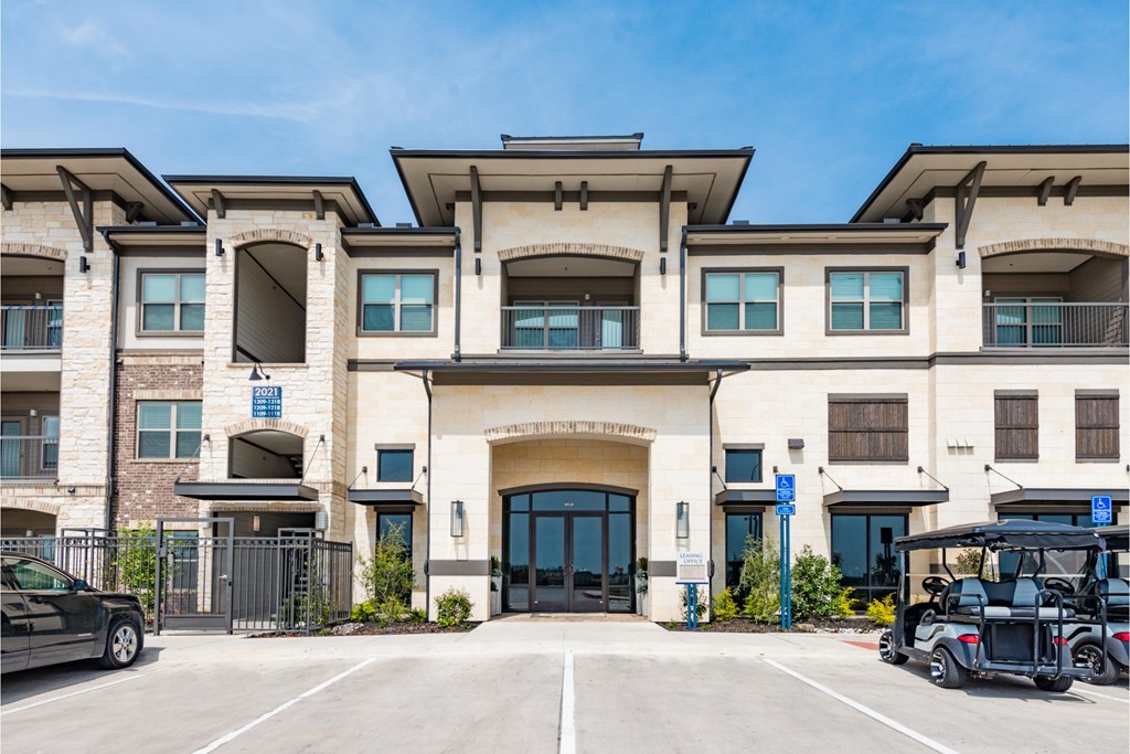 a large building with motorcycles parked in front of it