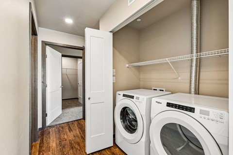 A laundry room with a washer and dryer.
