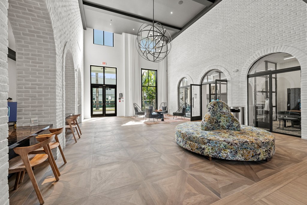 A large room with a fountain in the middle of it.