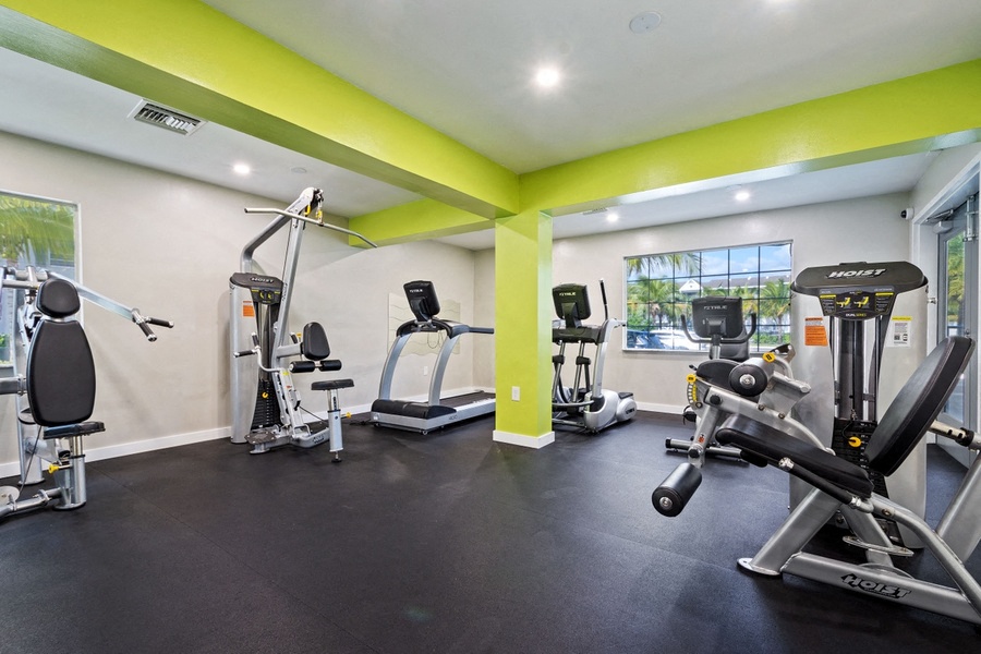 Fitness center with treadmill, elliptical, and weight machines