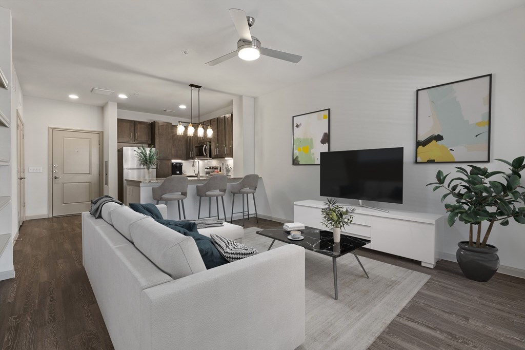 a living room with a couch and a tv