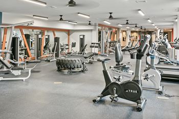 a gym filled with weights and other exercise equipment