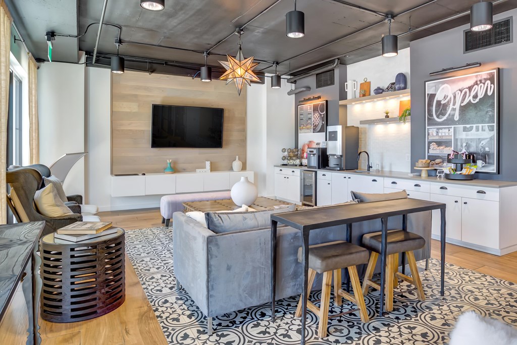 a living room with a couch and a table