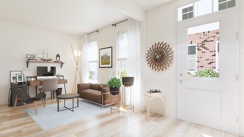 A living room with a brown couch, a chair, a table, a plant, and a clock on the wall.