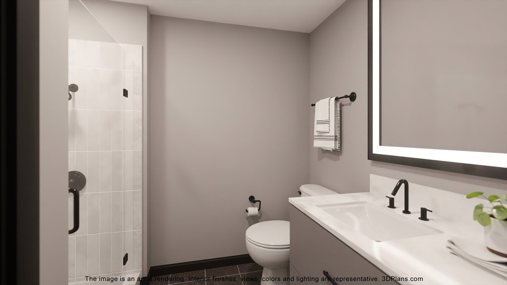 a bathroom with a toilet and a sink and a mirror