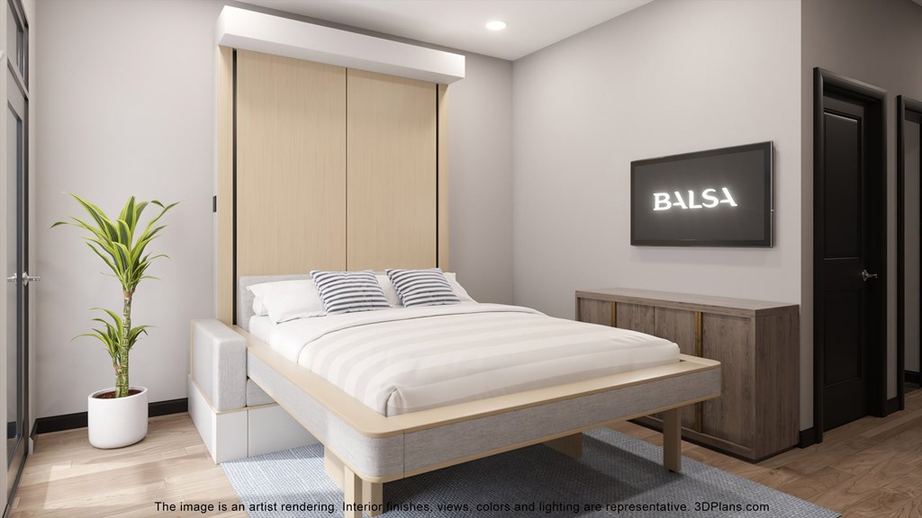 a bedroom with a bed and a cabinet and a plant