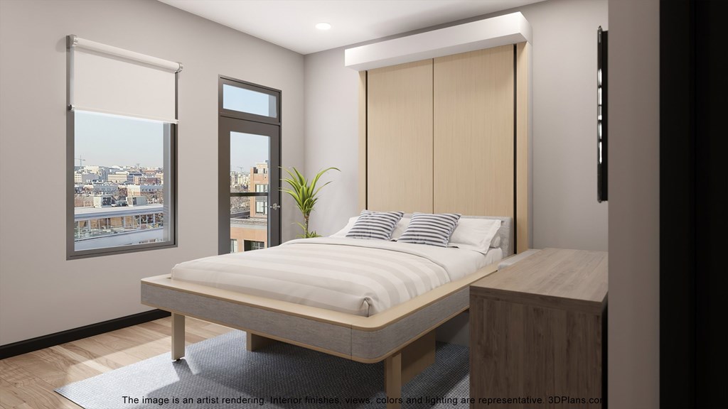 an image of a bedroom with a bed and a desk