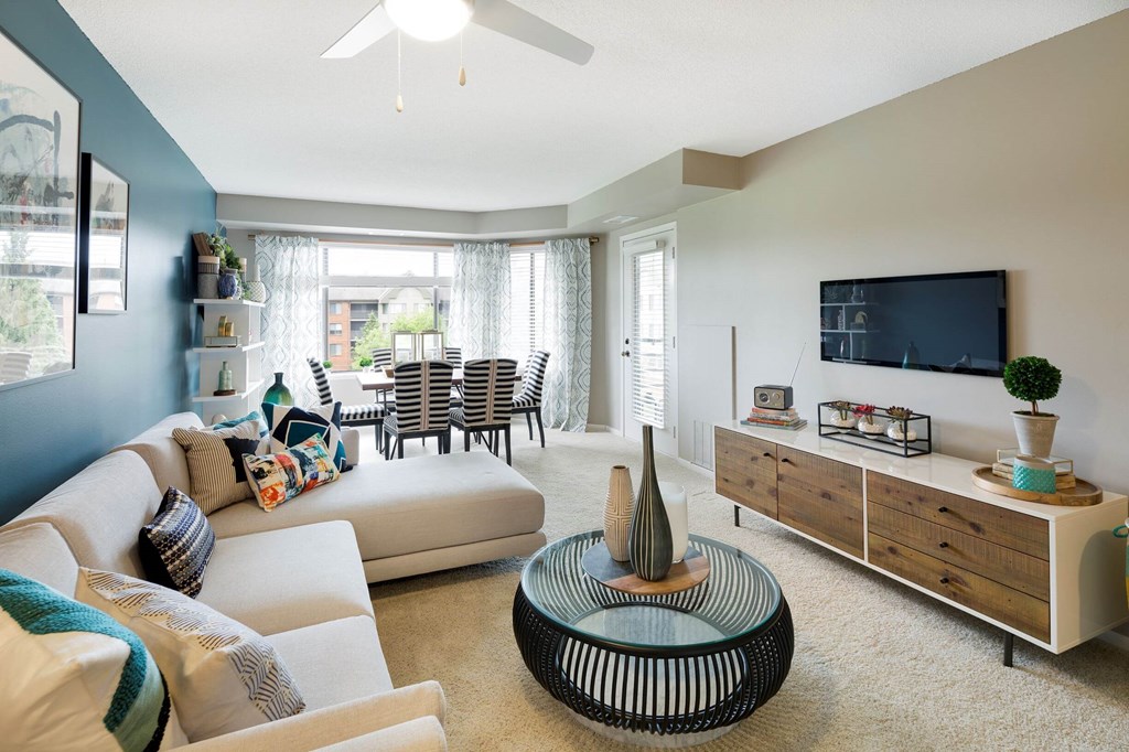 a living room with a couch and a tv