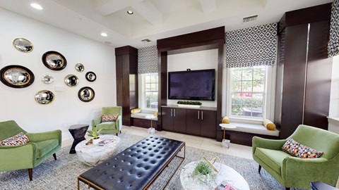 a living room with a tv and a table