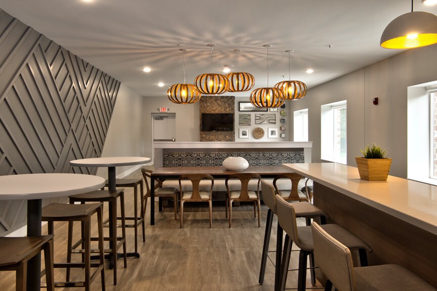 the dining area of a restaurant with tables and chairs