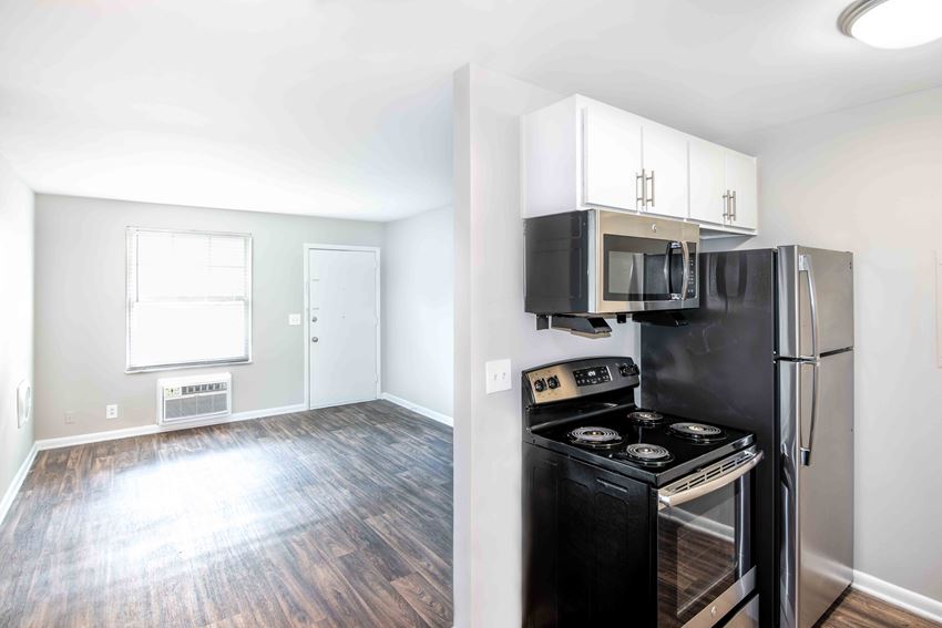 Apartments in Murfreesboro TN - Condos at the Villager - Living Room with Wood-Style Flooring