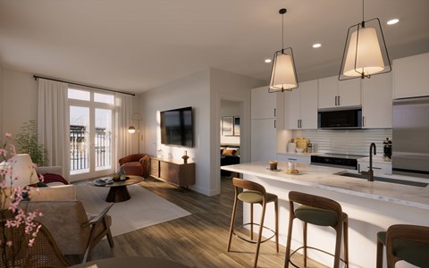 A modern kitchen with a bar stool and a countertop.